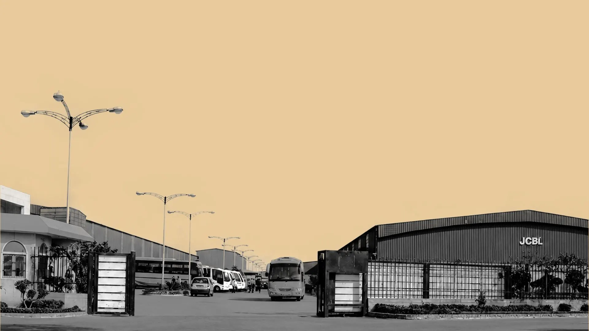 JCBL manufacturing facility at Lalru, Punjab, with buses and coaches at the factory gate