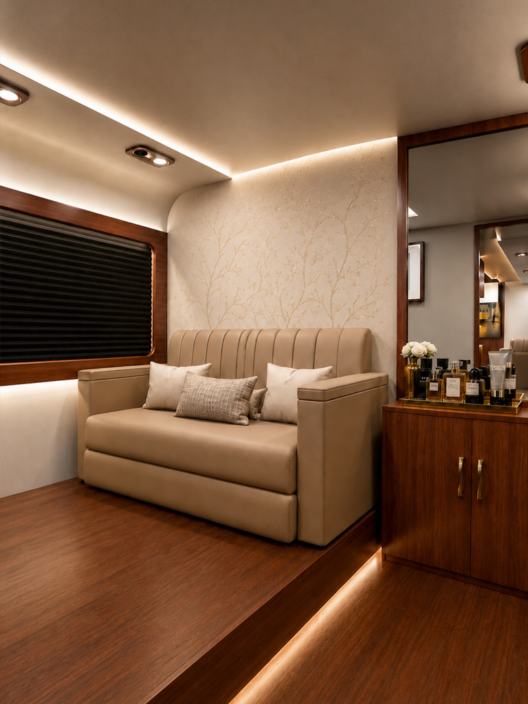 Full-size bed with layered linens beside a wide window